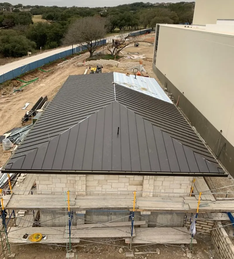 Metal roof new construction with scaffolding in Rapho